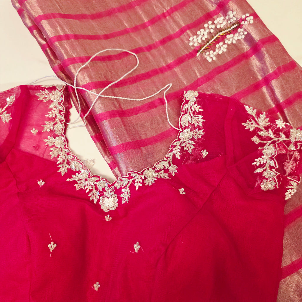 Hotpink Viscious Orgamza Stripes Saree with Net designer blouse