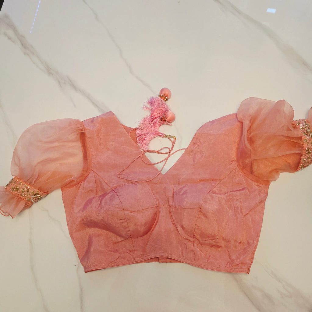 Pink and Blue Designer Saree with trending sleeves blouse.