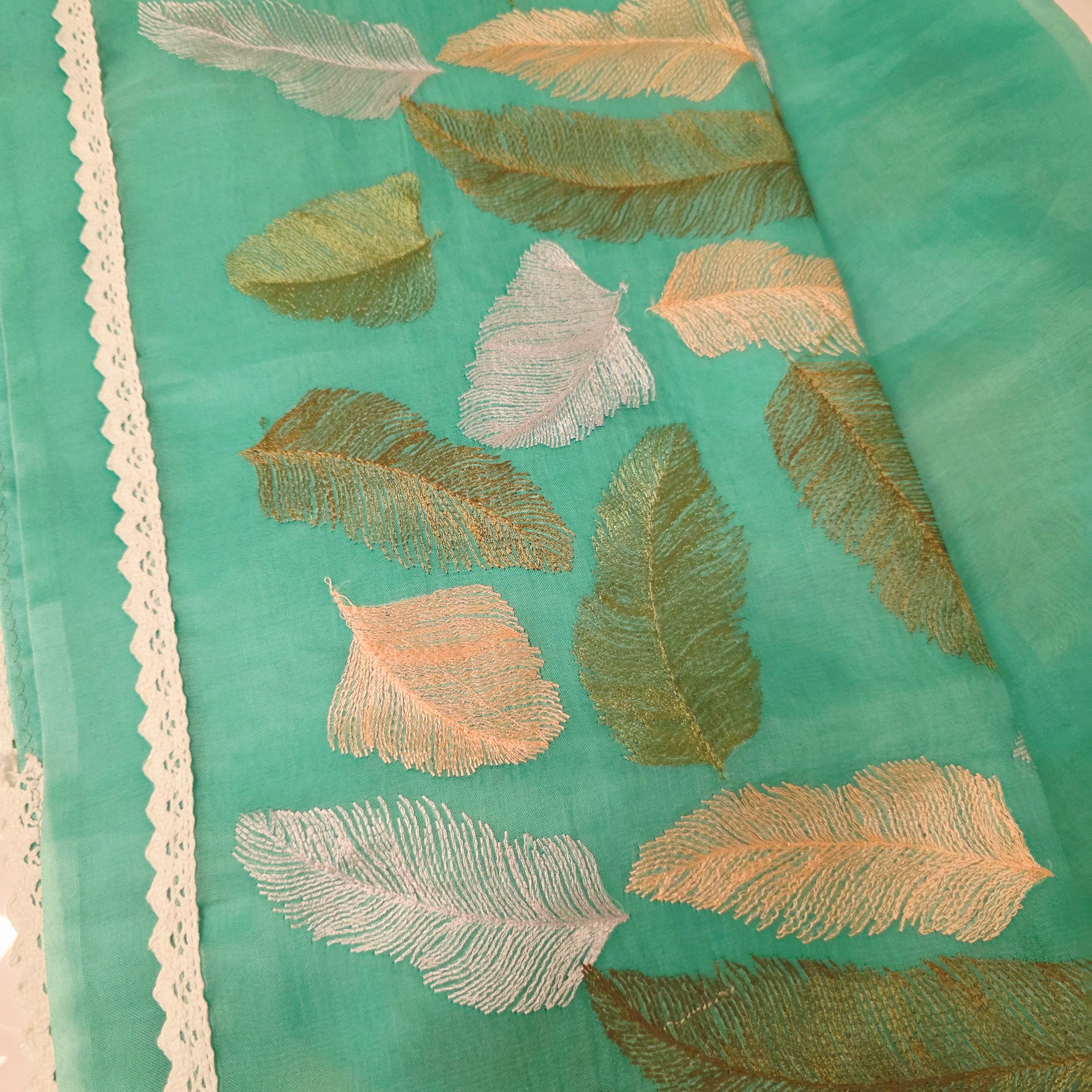 Tealblue Soft Organza Saree with leaf embroidery allover. Paired with soft sequin blouse.